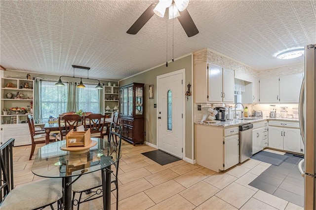 7234 Post Rd, Winston, GA 30187 - kitchen featuring appliances with stainless steel finishes, light countertops, a ceiling fan, and white cabinets