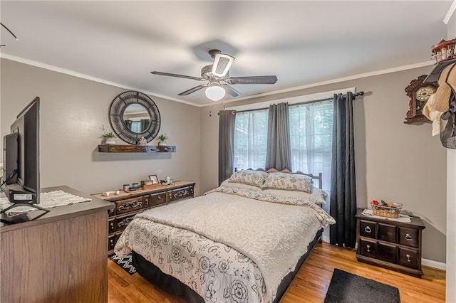 7234 Post Rd, Winston, GA 30187 - bedroom featuring crown molding, light wood-style flooring, and a ceiling fan