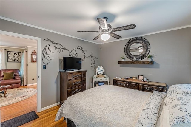 7234 Post Rd, Winston, GA 30187 - bedroom featuring wood finished floors, ornamental molding, and a ceiling fan