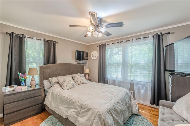 7234 Post Rd, Winston, GA 30187 - bedroom with multiple windows, wood finished floors, ornamental molding, and a ceiling fan