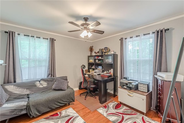 7234 Post Rd, Winston, GA 30187 - bedroom with an office area, light wood finished floors, ornamental molding, and a ceiling fan