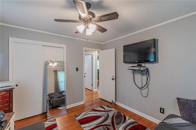 7234 Post Rd, Winston, GA 30187 - living room featuring a ceiling fan, ornamental molding, and wood finished floors