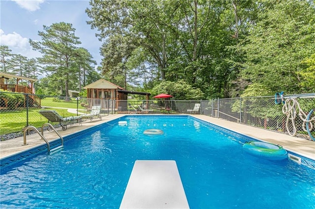 7234 Post Rd, Winston, GA 30187 - view of pool with a diving board, a gazebo, a patio, and view of wooded area
