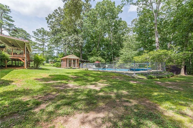 7234 Post Rd, Winston, GA 30187 - view of yard with a deck, a ceiling fan, and stairs