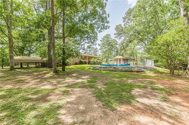 7234 Post Rd, Winston, GA 30187 - view of yard featuring a detached carport