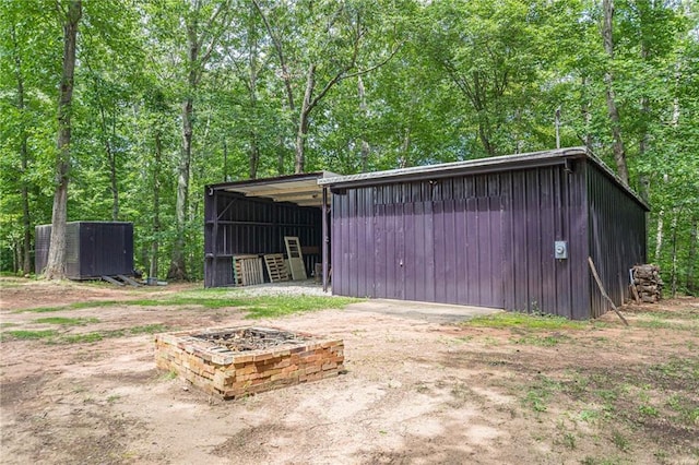 7234 Post Rd, Winston, GA 30187 - view of pole building featuring a forest view