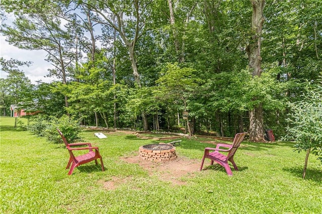 7234 Post Rd, Winston, GA 30187 - view of grassy yard with a fire pit