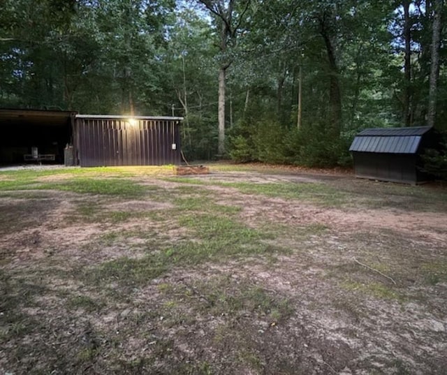 7234 Post Rd, Winston, GA 30187 - view of yard featuring driveway and a shed