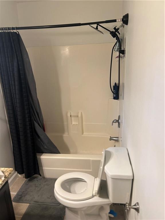 122 Sterling Ct Unit 122, Alpharetta, GA 30004 - bathroom with toilet, shower / bath combination with curtain, and vanity