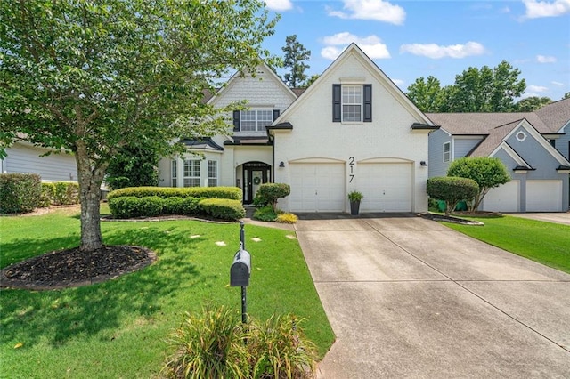 217 Springs Xing, Canton, GA 30114 - traditional-style home with a garage, driveway, and a front yard