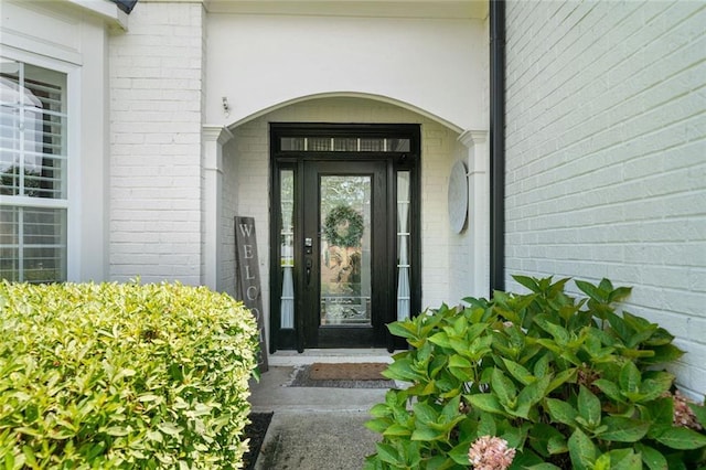 217 Springs Xing, Canton, GA 30114 - doorway to property featuring brick siding