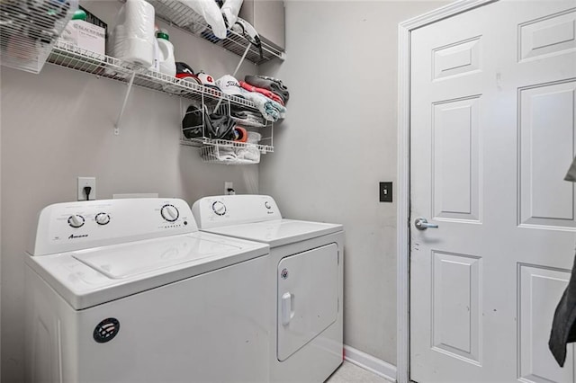 217 Springs Xing, Canton, GA 30114 - laundry area featuring washing machine and dryer and baseboards