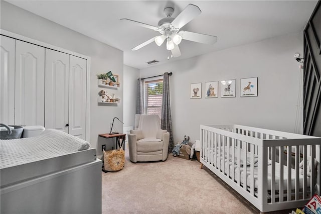 217 Springs Xing, Canton, GA 30114 - carpeted bedroom with a closet, ceiling fan, and a nursery area