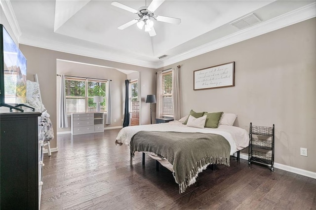 217 Springs Xing, Canton, GA 30114 - bedroom featuring a raised ceiling, wood finished floors, ornamental molding, and ceiling fan