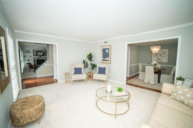 909 NE Otter Way NE, Marietta, GA 30068 - living room featuring ornamental molding and a chandelier