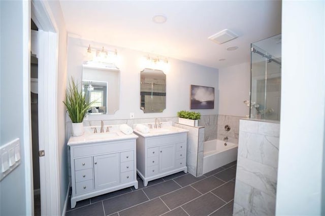 909 NE Otter Way NE, Marietta, GA 30068 - full bathroom with two vanities, a bath, tile patterned floors, and a shower