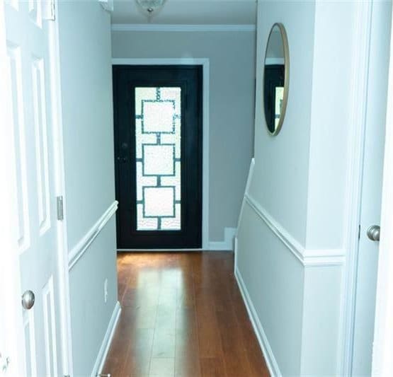 909 NE Otter Way NE, Marietta, GA 30068 - entryway with wood finished floors and crown molding