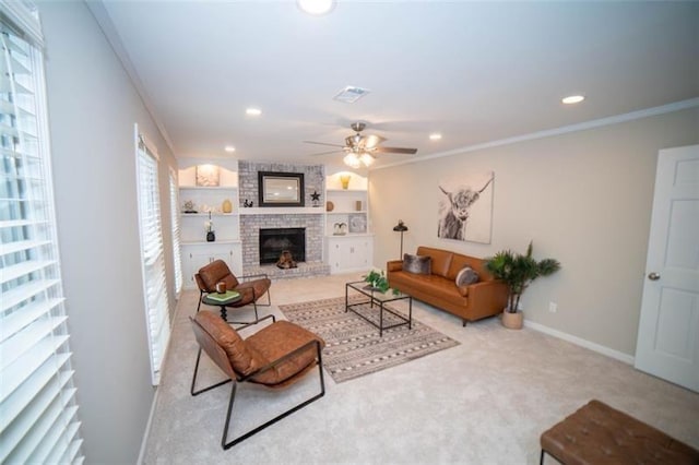 909 NE Otter Way NE, Marietta, GA 30068 - living area featuring crown molding, ceiling fan, a brick fireplace, light carpet, and recessed lighting