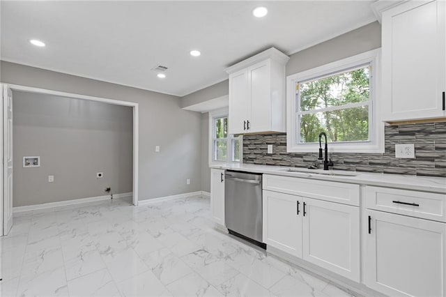 2310 Whitehead Place Dr, Suwanee, GA 30024 - kitchen with stainless steel dishwasher, light countertops, decorative backsplash, recessed lighting, and white cabinets