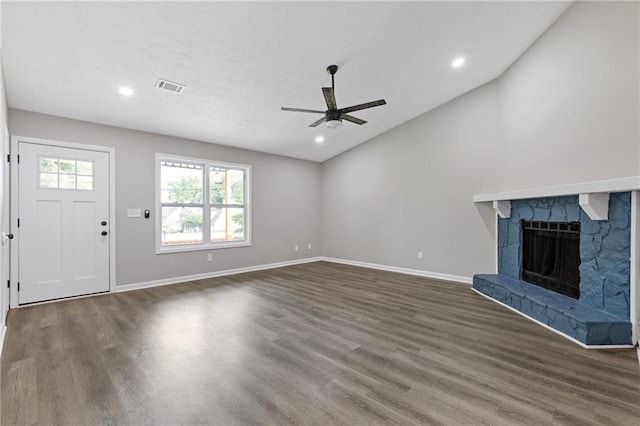2310 Whitehead Place Dr, Suwanee, GA 30024 - unfurnished living room featuring ceiling fan, wood finished floors, a stone fireplace, vaulted ceiling, and recessed lighting