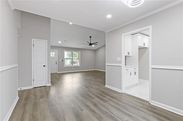 2310 Whitehead Place Dr, Suwanee, GA 30024 - unfurnished living room with ceiling fan, light wood-style floors, ornamental molding, and recessed lighting