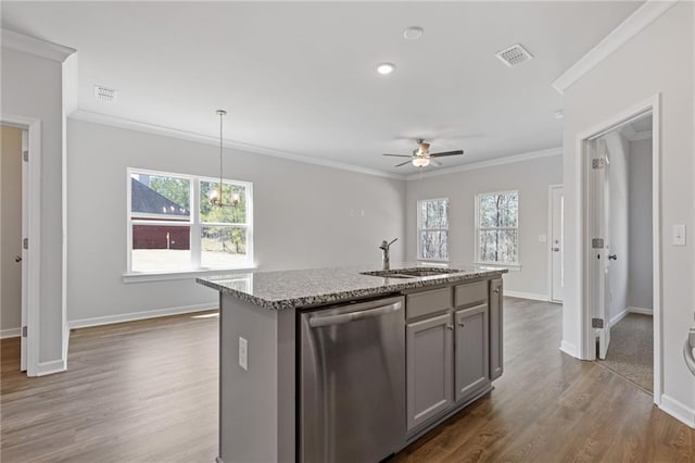 kitchen featuring dishwasher, a sink, ornamental molding, and gray cabinets