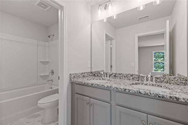 full bath with marble finish floor, a sink, and visible vents