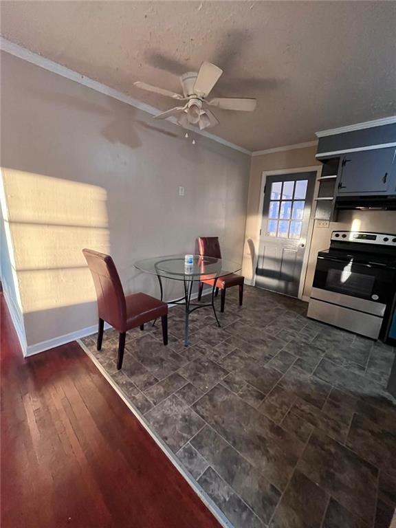 living area featuring crown molding, ceiling fan, and dark wood-type flooring
