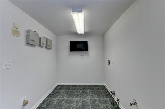 laundry room featuring laundry area and baseboards