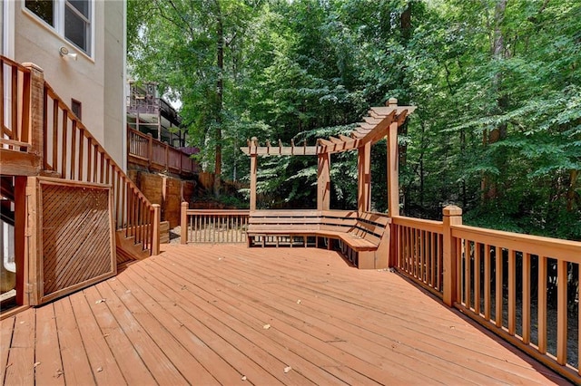 wooden deck with a pergola