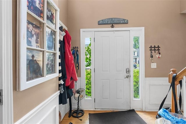 5077 Newpark Dr NW, Acworth, GA 30101 - entryway with a wainscoted wall and wood finished floors