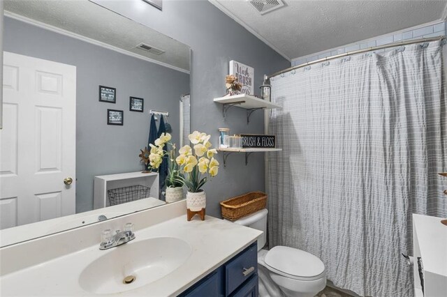 5077 Newpark Dr NW, Acworth, GA 30101 - bathroom featuring crown molding, toilet, visible vents, and vanity