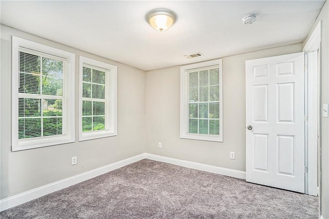 view of carpeted spare room