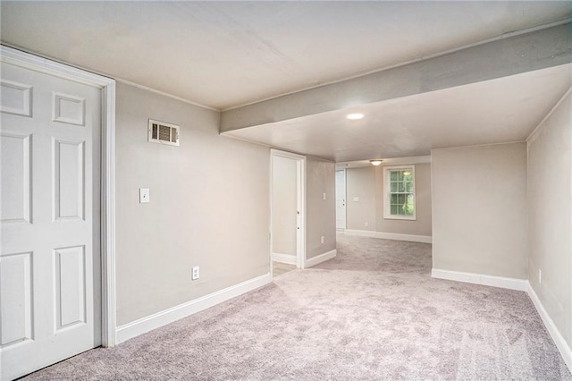 empty room with light colored carpet