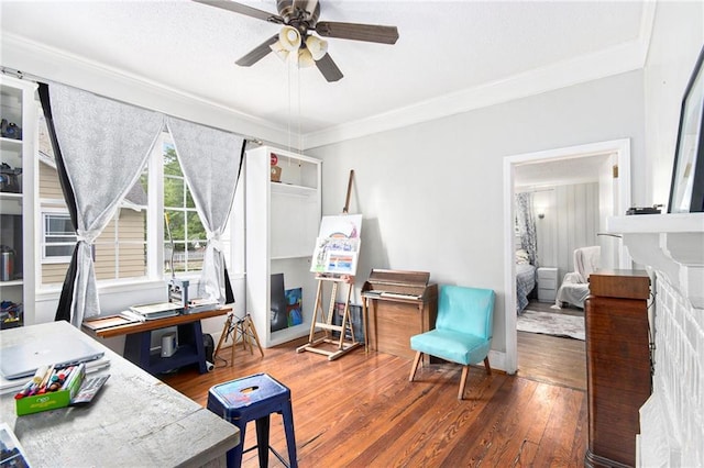 bedroom featuring wood-type flooring, ceiling fan, a textured ceiling, and ornamental molding