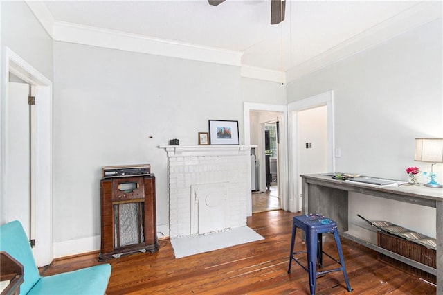 bathroom featuring crown molding, wood finished floors, vanity, baseboards, and toilet