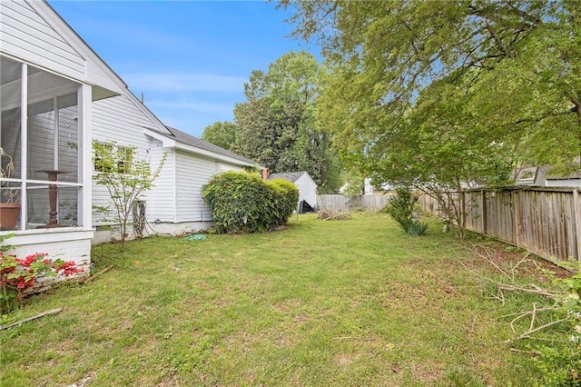 view of yard with a fenced backyard