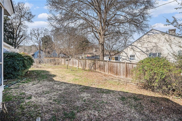 view of yard featuring fence