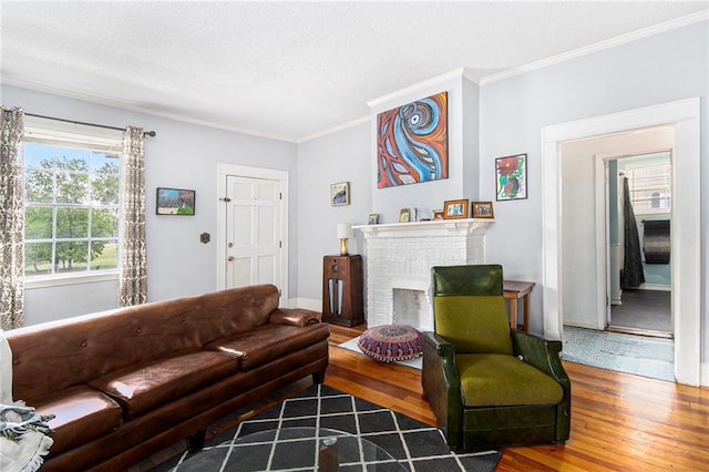 kitchen featuring white cabinets, stainless steel appliances, a sink, a notable chandelier, and ornamental molding