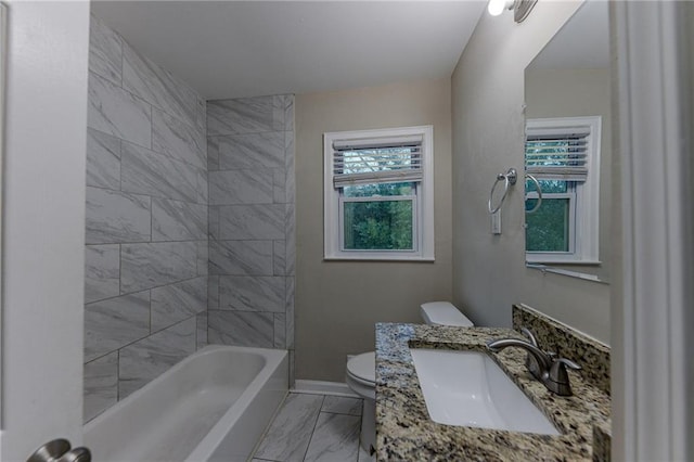 3147 Canary Ct, Decatur, GA 30032 - full bathroom with toilet, vanity, and tiled shower / bath combo