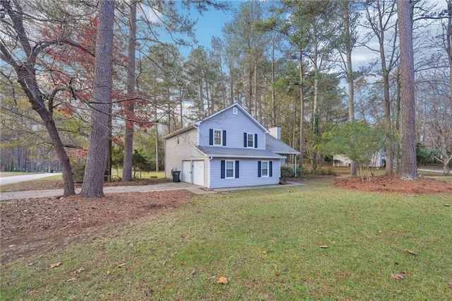 view of property exterior featuring a garage and a lawn