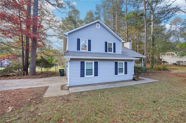 exterior space with a lawn