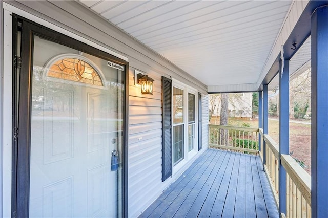 unfurnished sunroom with a wealth of natural light