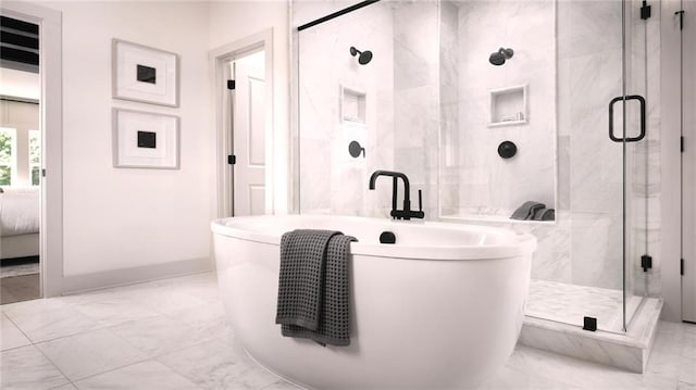 bathroom with shower with separate bathtub