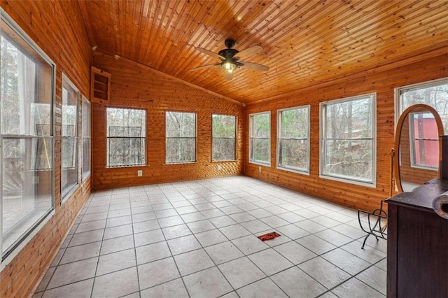 unfurnished sunroom with lofted ceiling, wood ceiling, and ceiling fan