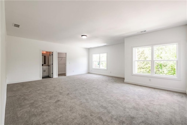 spare room featuring carpet flooring