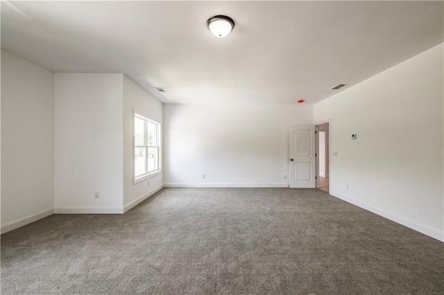 unfurnished room with carpet flooring