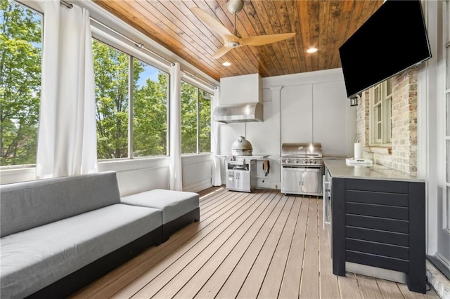 2362 Saint Davids Sq NW, Kennesaw, GA 30152 - sunroom / solarium with ceiling fan, area for grilling, and an outdoor hangout area