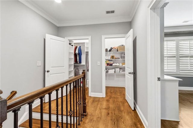 2362 Saint Davids Sq NW, Kennesaw, GA 30152 - hallway featuring crown molding, an upstairs landing, wood finished floors, and baseboards