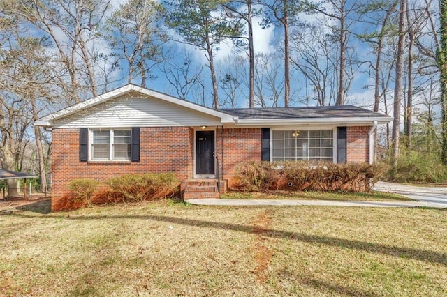 ranch-style house with brick siding and a front lawn